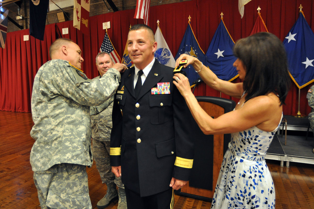 Military officer with rank via promotion crossword clue